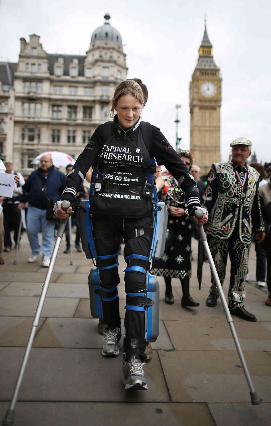Claire Lomas, a paraplegic, walks the last mile of the London Marathon in May 2012. Starting out with 36,000 other runners, she averaged two miles a day with the help of a bionic ReWalk suit by Argo Medical Technologies.