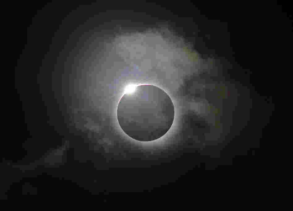 The Diamond Ring effect is shown following totality of the solar eclipse at Palm Cove in Australia's Tropical North Queensland Wednesday. The Diamond Ring effect is shown following totality of the solar eclipse at Palm Cove in Australia's Tropical North Queensland Wednesday.