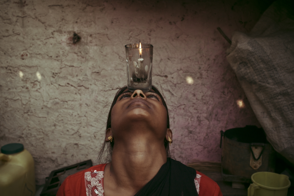 Maya Pawas, 16, is an acrobat in Kathputli. Her parents began stretching her limbs when she was only 3 years old. Now she is widely regarded as the most talented acrobat in the colony.