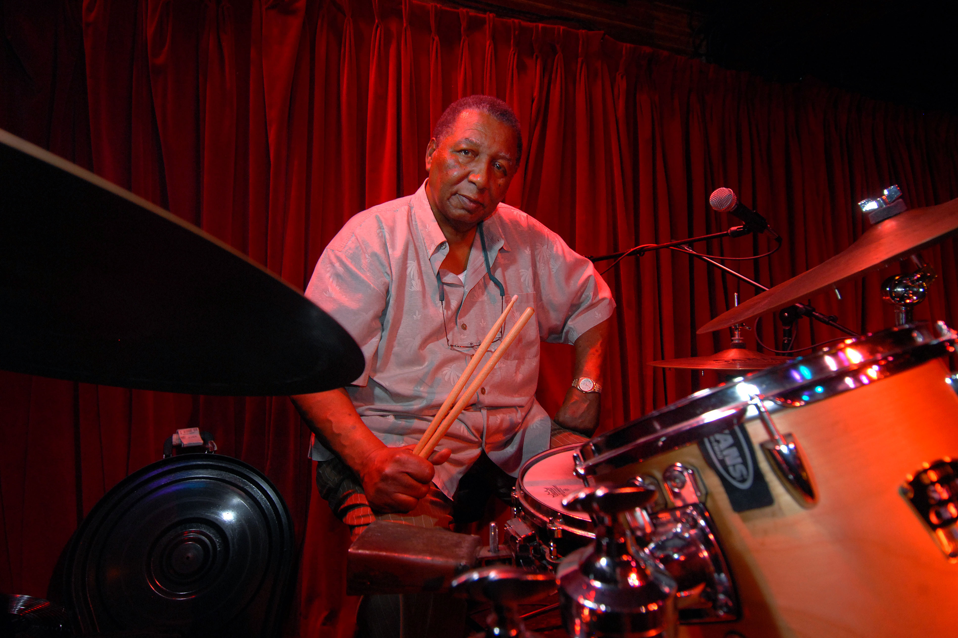 Bob French sits at his drum set prior to performing at the New Orleans club d.b.a. in 2007.