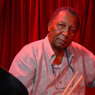 Bob French sits at his drum set prior to performing at the New Orleans club d.b.a. in 2007.
