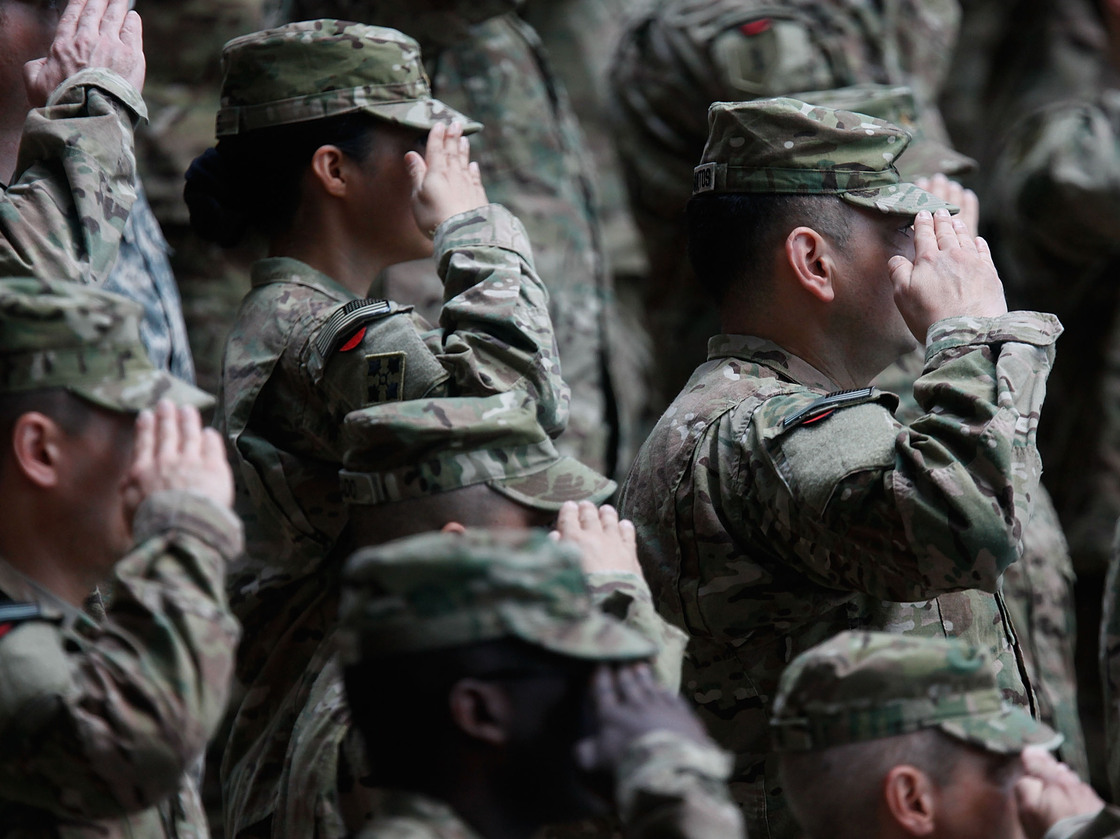 Soldiers of the U.S. Army V Corps conduct a color casing ceremony to mark the departure of V Corps headquarters from Europe on May 10, 2012, at the U.S. Army base in Wiesbaden, Germany.