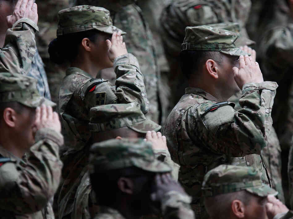 Soldiers of the U.S. Army V Corps conduct a color casing ceremony to mark the departure of V Corps headquarters from Europe on May 10, 2012, at the U.S. Army base in Wiesbaden, Germany.