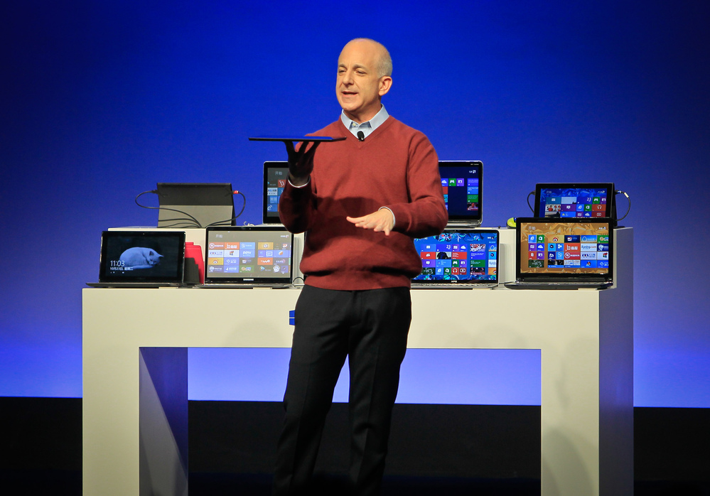 Steven Sinofsky introduces a new Microsoft tablet computer and Windows 8 software to the media in Shanghai on Oct. 23. The former president of Microsoft's Windows division has since left the company.