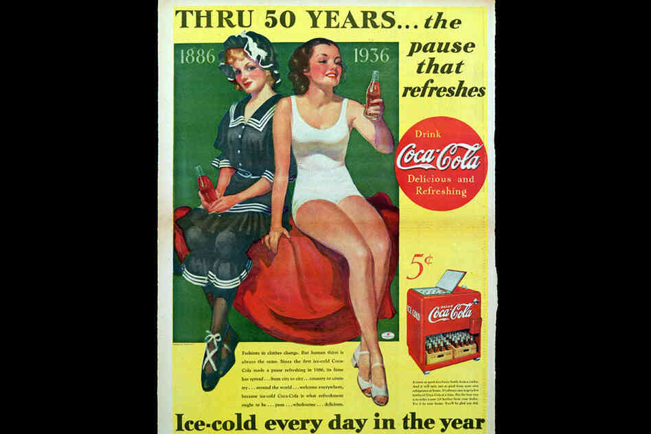 1936: An ad highlighting 50 years of Coca-Cola.