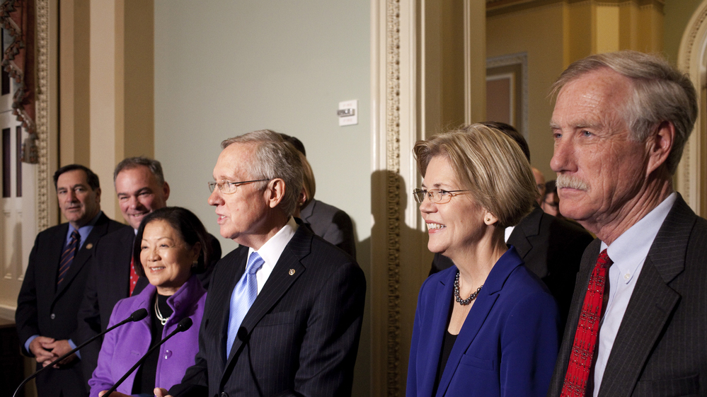 Sen.-elect Angus King of Maine (far right) joins newly elected Democratic senators and Senate Majority Leader Harry Reid on Capitol Hill on Wednesday. From left: Joe Donnelly of Indiana, Tim Kaine of Virginia, Mazie Hirono of Hawaii, Reid, and Elizabeth Warren of Massachusetts.