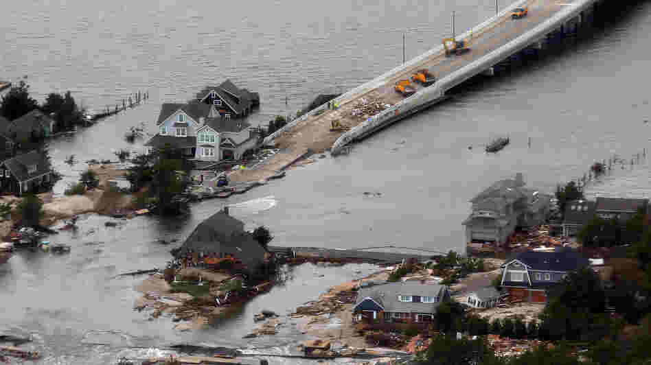 Sandy punched a hole in the barrier island that holds the affluent borough of Mantoloking, N.J., temporarily splitting the community in two. The storm also destroyed several multimillion-dollar homes and erased the island's protective system of dunes.