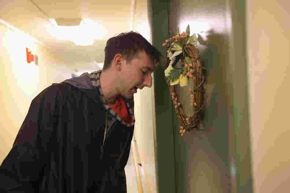 Democratic party volunteer Matt Lattanzi worked door to door for the Obama campaign while canvassing in a Youngstown, Ohio, apartment building on Oct. 28.