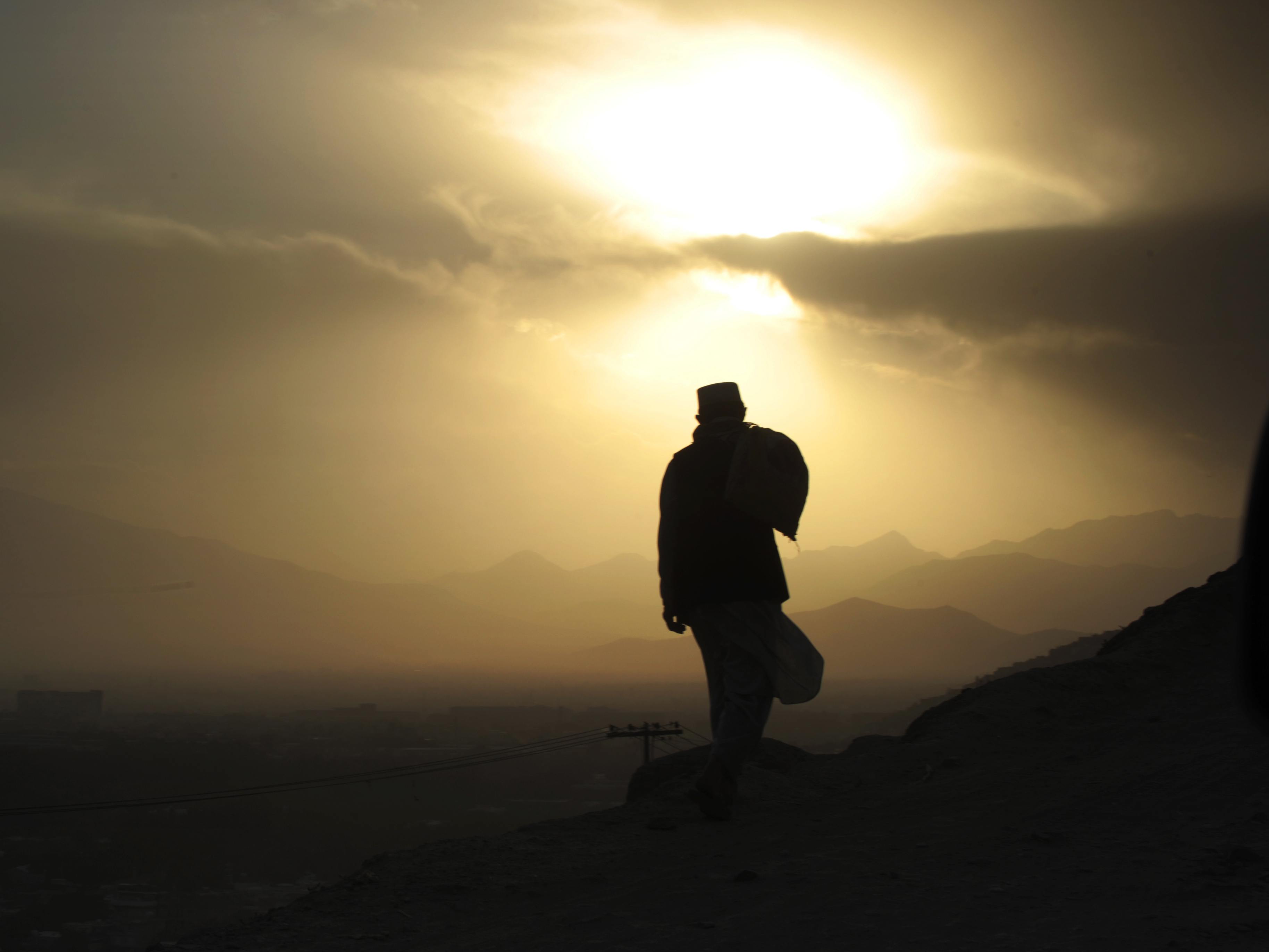 Are better days ahead in Afghanistan? A new survey signals that just more than half of Afghans think their country is headed in the right direction. Here: Mohamed, who makes a living by working as a day laborer in construction, makes his way home after work in Kabul. Are better days ahead in Afghanistan? A new survey signals that just more than half of Afghans think their country is headed in the right direction. Here: Mohamed, who makes a living by working as a day laborer in construction, makes his way home after work in Kabul.