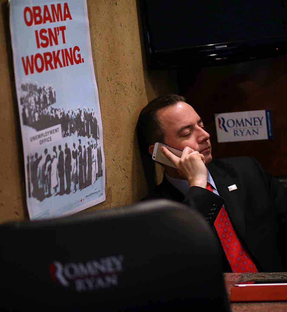 Republican National Committee Chairman Reince Priebus rides the Mitt Romney campaign bus days before the presidential election. Despite Romney's loss and other GOP failures, Priebus, who helped the party raise huge sums of money in 2012, may seek a second term.