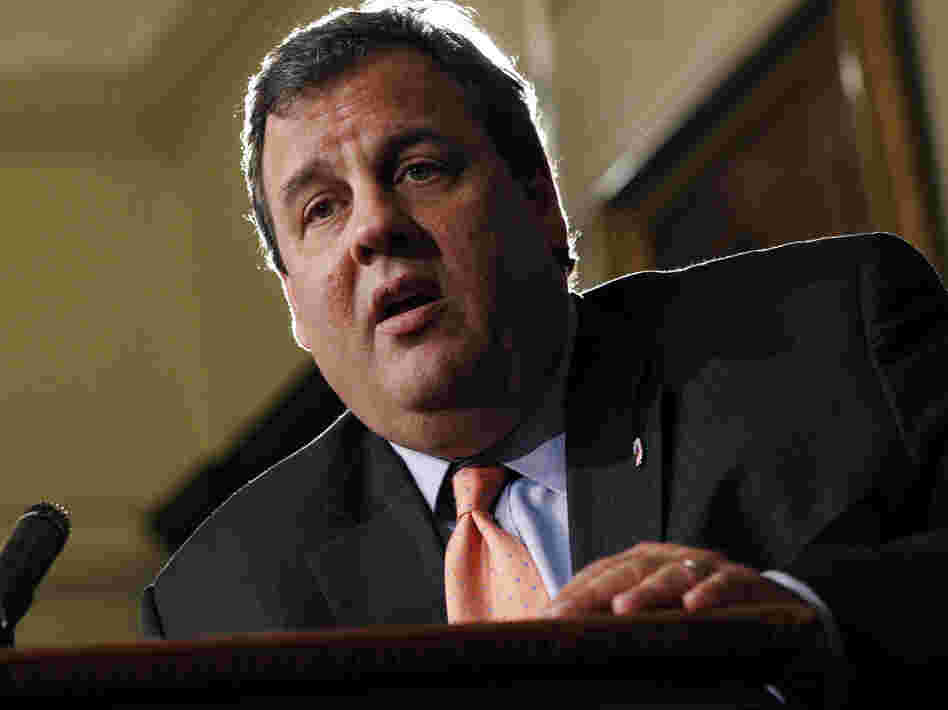New Jersey Gov. Chris Christie listens to a question in Trenton, N.J., Tuesday. He has refused to tip his hand on whether New Jersey will set up a federally mandated health insurance exchange or let the federal government handle the chores.