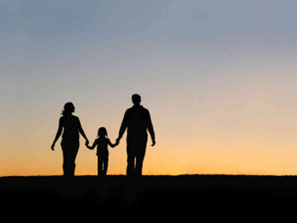 Silhouette of parents and child. Silhouette of parents and child.