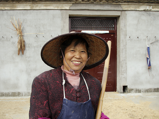 Wang Heying, 64, supports the new Communist leaders, even if she can barely name them. She says government  policies have led street lamps, bigger houses and a TV in every home.