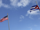 American and Cuban flags in the Little Havana neighborhood of Miami. American and Cuban flags in the Little Havana neighborhood of Miami.