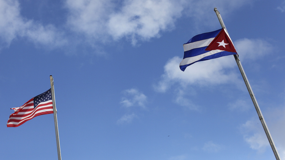 American and Cuban flags in the Little Havana neighborhood of Miami.