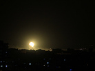 Fire rises from a building during an explosion following an Israeli strike in the town of Rafah in the southern Gaza Strip on Friday. Fire rises from a building during an explosion following an Israeli strike in the town of Rafah in the southern Gaza Strip on Friday.