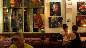 Paintings of Burmese street scenes decorate the walls of Aiya. Patrons who come for the Burmese and Thai food can also find portraits of Che Guevara and Aung San Suu Kyi, and bumper stickers declaring "Peace in Burma Now."