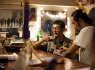 Myat Thu, who owns the Aiya restaurant, takes a break at the bar with his chef Ney Minn. They both grew up in the Burmese capital, Rangoon. Myat Thu, who owns the Aiya restaurant, takes a break at the bar with his chef Ney Minn. They both grew up in the Burmese capital, Rangoon.