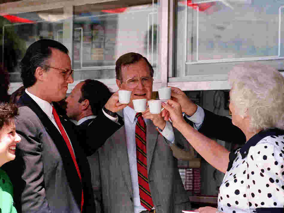 Vice President George H.W. Bush toasts with cups of Cuban coffee on June 17, 1987, in the Little Havana neighborhood of Miami. Bush, who was in Florida to raise funds for his bid for the Republican presidential nomination, stopped at the restaurant after ceremonies renaming a street in the neighborhood for President Reagan.