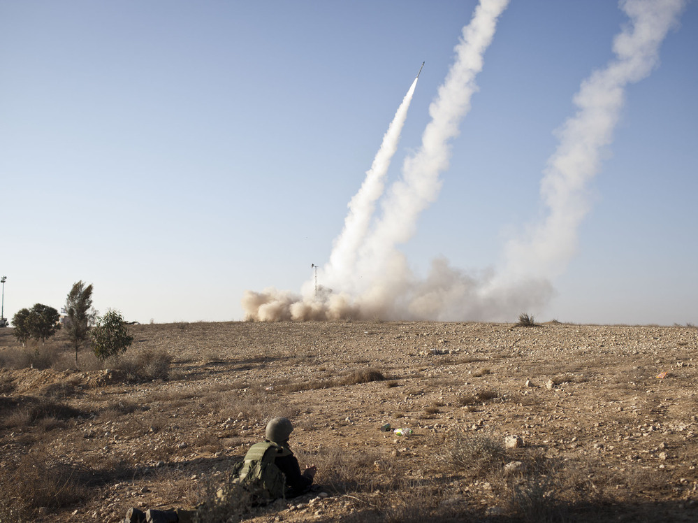 Israel's anti-rocket system, known as Iron Dome, is shown in action on Thursday, Nov. 15, near Beer Sheva, in southern Israel. The system is designed to shoot down incoming rockets launched by Palestinians in the nearby Gaza Strip. Israel's anti-rocket system, known as Iron Dome, is shown in action on Thursday, Nov. 15, near Beer Sheva, in southern Israel. The system is designed to shoot down incoming rockets launched by Palestinians in the nearby Gaza Strip.