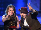 Jesse & Joy accept one of their four awards during the Latin Grammy Awards in Las Vegas on Thursday. Jesse & Joy accept one of their four awards during the Latin Grammy Awards in Las Vegas on Thursday.