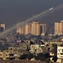Palestinian militants fire a rocket from the northern Gaza Strip toward southern Israel on Thursday. For the past decade, Palestinians in Gaza have been shooting short-range rockets into southern Israel. But Palestinians fired a much longer range rocket that landed just outside Jerusalem on Friday, a move seen as a major escalation.
