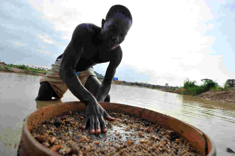 A diamond prospector filters earth from a river in Koidu, the capital of diamond-rich Kono district in eastern Sierra Leone. Koidu suffered some of the worst ravages of Sierra Leone's war in the 1990s as rebels forced citizens to mine at gunpoint. Ten years after the conflict, diamonds remain a contentious issue. A diamond prospector filters earth from a river in Koidu, the capital of diamond-rich Kono district in eastern Sierra Leone. Koidu suffered some of the worst ravages of Sierra Leone's war in the 1990s as rebels forced citizens to mine at gunpoint. Ten years after the conflict, diamonds remain a contentious issue.