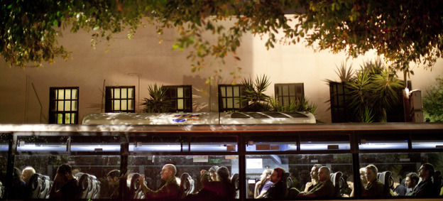 Israeli reserve soldiers ride a bus heading to the south of the country after being called up for duty Friday in Tel Aviv, Israel. Israeli reserve soldiers ride a bus heading to the south of the country after being called up for duty Friday in Tel Aviv, Israel.