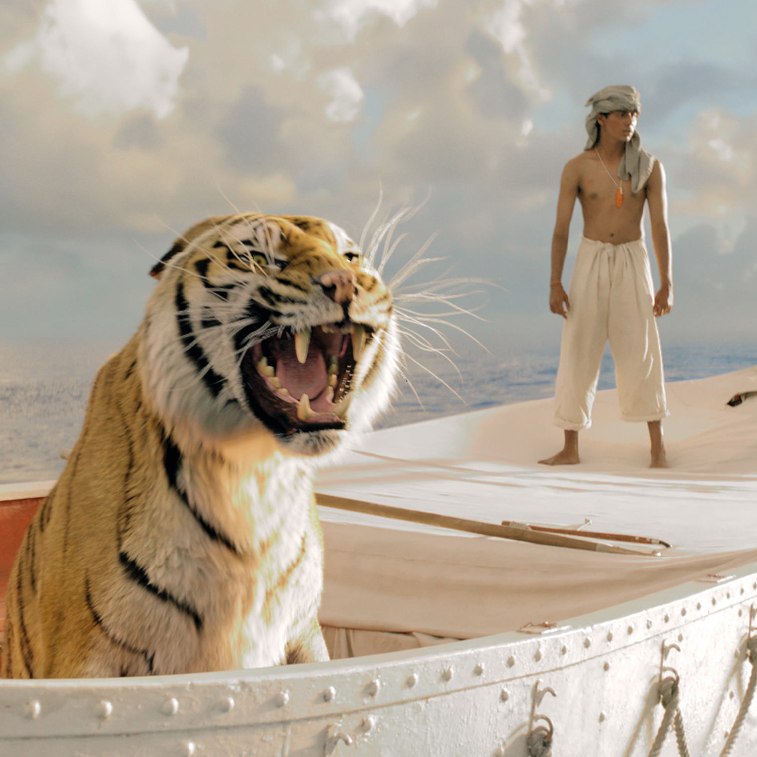 Pi Patel (Suraj Sharma) and a fierce Bengal tiger named Richard Parker must rely on each other to survive an epic journey in Life of Pi.