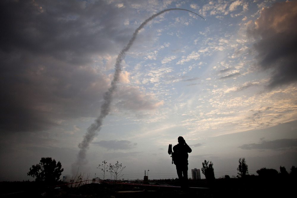 A missile from Israel's Iron Dome defense missile system launches to intercept and destroy incoming rocket fire from Gaza on Saturday in Tel Aviv, Israel. A missile from Israel's Iron Dome defense missile system launches to intercept and destroy incoming rocket fire from Gaza on Saturday in Tel Aviv, Israel.