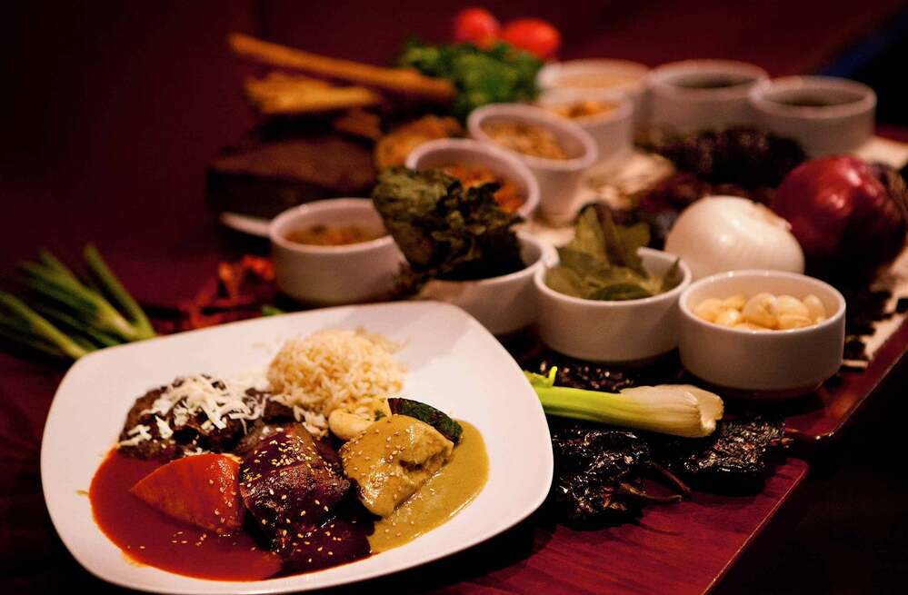 Three of the six moles served at Casa Oaxaca of Washington, D.C. Some of these mole recipes were passed down to chef Alfio Blangiardo by his grandmother.