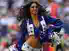 A Dallas Cowboys cheerleader performs at Cowboys Stadium.
