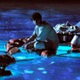Pi takes in the bioluminescent wonders of the sea.