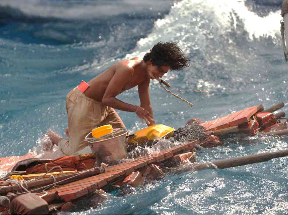 As a teenager, Pi (the younger version played here by Suraj Sharma) is lost at sea with a Bengal tiger.