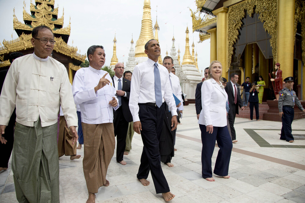 President Obama (center) and U.S. Secretary of State Hillary Clinton (right) toured the Shwedagon Pagoda in Yangon, Myanmar, on Monday.