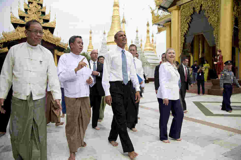President Obama (center) and U.S. Secretary of State Hillary Clinton (right) toured the Shwedagon Pagoda in Yangon, Myanmar, on Monday.