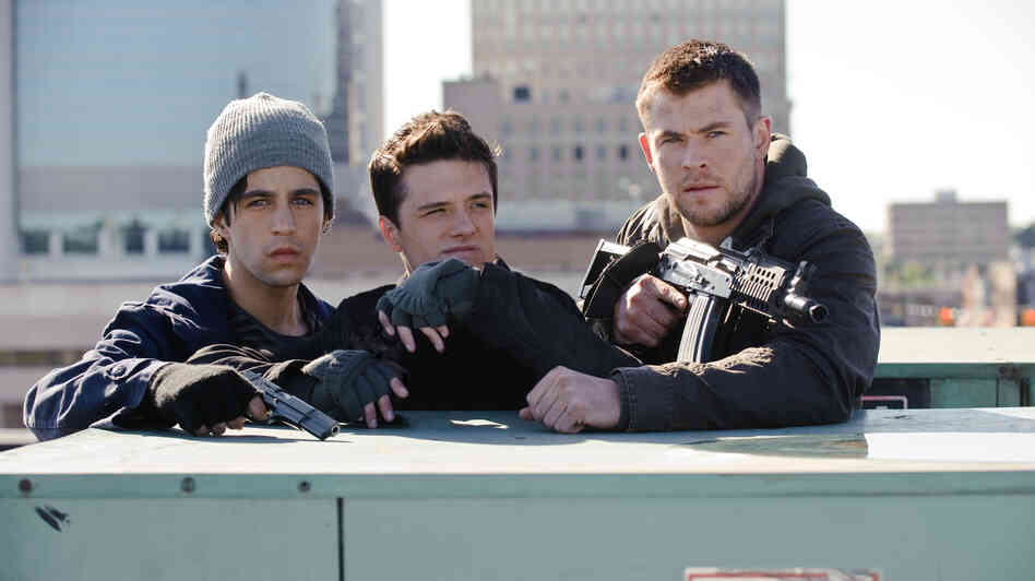 From left: Matt Eckert (Josh Peck) and his friend Robert (Josh Hutcherson) join Matt's Marine brother Jed (Chris Hemsworth) on a mission to stop North Korean invaders.