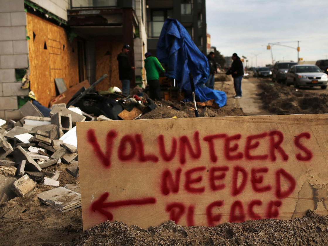 In New York City's Rockaway neighborhood, a sign asking for help in the clean-up.