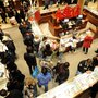 People crowd the aisles inside Macy's department store Nov. 25, 2011, in New York after the midnight opening to begin the "Black Friday" shopping weekend. People crowd the aisles inside Macy's department store Nov. 25, 2011, in New York after the midnight opening to begin the "Black Friday" shopping weekend.