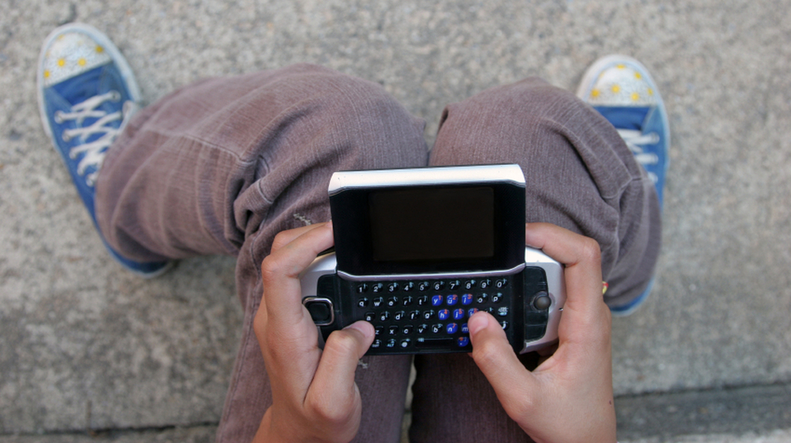 As more teens get mobile devices, parents are using apps to track their every tweet and post.