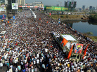 Bal Thackeray's funeral cortege made its way through a sea of supporters in Mumbai on Sunday. Bal Thackeray's funeral cortege made its way through a sea of supporters in Mumbai on Sunday.