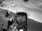 NASA's Mars rover Curiosity cut a wheel scuff mark into a wind-formed ripple at the "Rocknest" site to give researchers a better opportunity to examine the particle-size distribution of the material forming the ripple. The rover's right Navigation camera took this image of the scuff mark on the mission's 57th Martian day. NASA's Mars rover Curiosity cut a wheel scuff mark into a wind-formed ripple at the "Rocknest" site to give researchers a better opportunity to examine the particle-size distribution of the material forming the ripple. The rover's right Navigation camera took this image of the scuff mark on the mission's 57th Martian day.