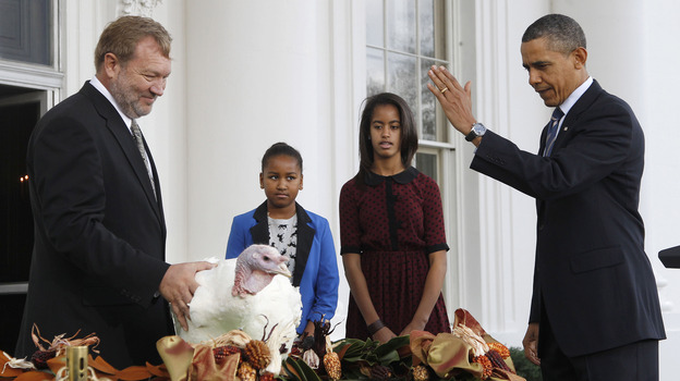 President Obama, with daughters Sasha and Malia, at last year's turkey pardoning ceremony. (AP)