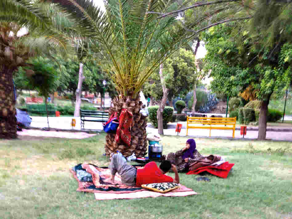 Syrians whose homes have been destroyed by recent shelling sleep in a Damascus park.