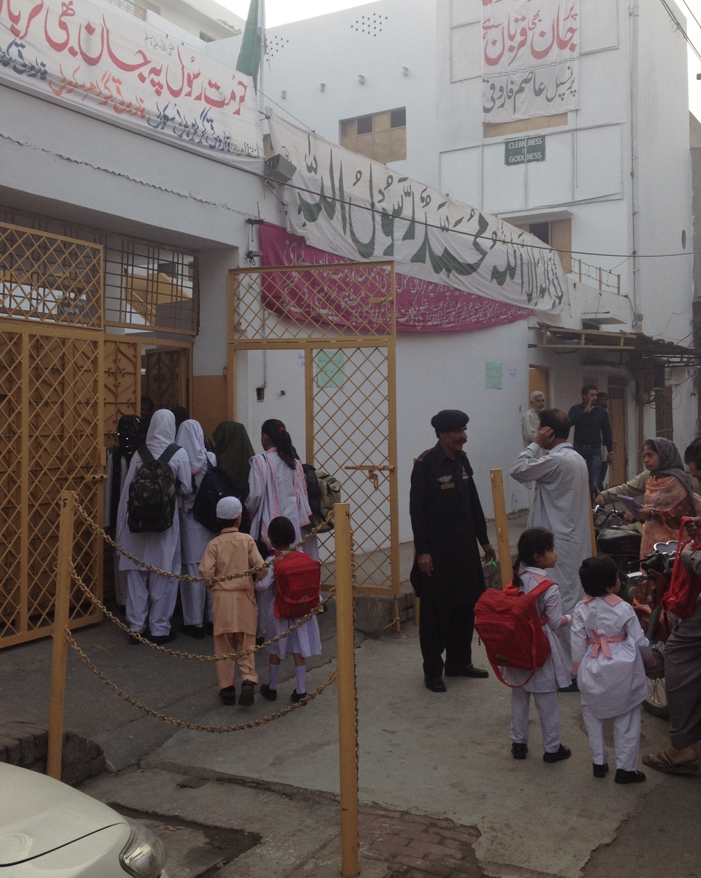 Students file into Lahore's reopened Farooqi Girls High School. The school was temporarily closed after a violent attack in October.