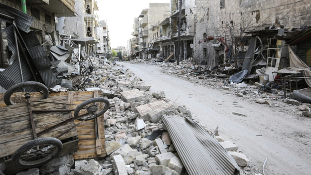 Rubble litters the street in the main souk or market area of Maraat al-Numan, Syria.