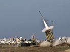 An Israeli missile is launched from the Iron Dome defense system, designed to intercept incoming rockets. This missile was fired from the southern Israeli city of Ashdod in response to a rocket launched from the nearby Palestinian Gaza Strip on Nov. 18. An Israeli missile is launched from the Iron Dome defense system, designed to intercept incoming rockets. This missile was fired from the southern Israeli city of Ashdod in response to a rocket launched from the nearby Palestinian Gaza Strip on Nov. 18.