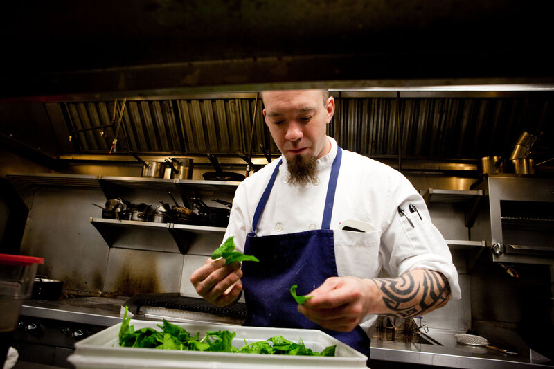 Start by melting 1 tablespoon of butter in a skillet. Add 2 tablespoons of shallots and saute. Add 4 cups of spinach. Cook on high heat until wilted.