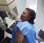 A mammographer prepares a screen-film mammography test for patient Alicia Maldonado at a hospital in Los Angeles. A mammographer prepares a screen-film mammography test for patient Alicia Maldonado at a hospital in Los Angeles.