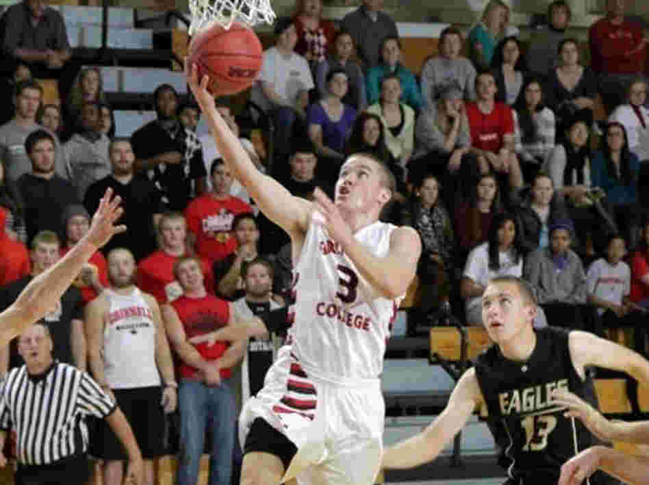 Going for the record: Grinnell College's Jack Taylor during Tuesday night's game, in which he scored 138 points.